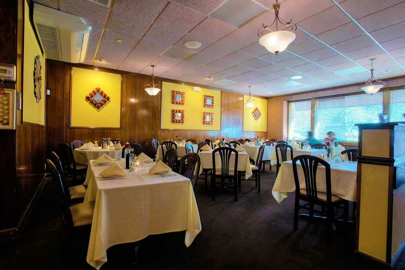 Dining room - showing eight tables in front of the restaurant